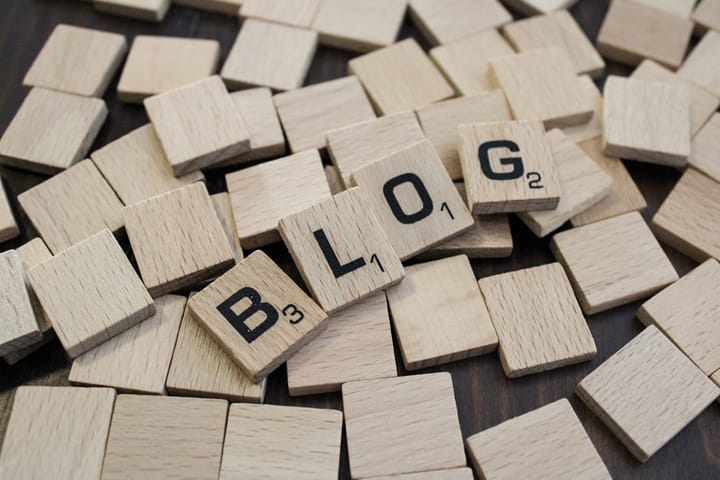 blogging - a pile of wooden blocks with the word blog spelled on them